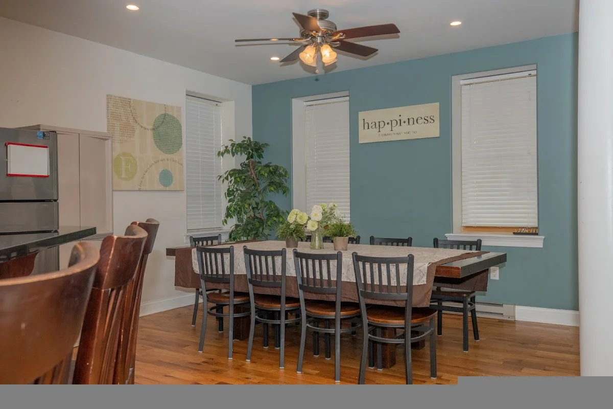 Spacious dining area with a large table in an intensive outpatient program in Philadelphia.